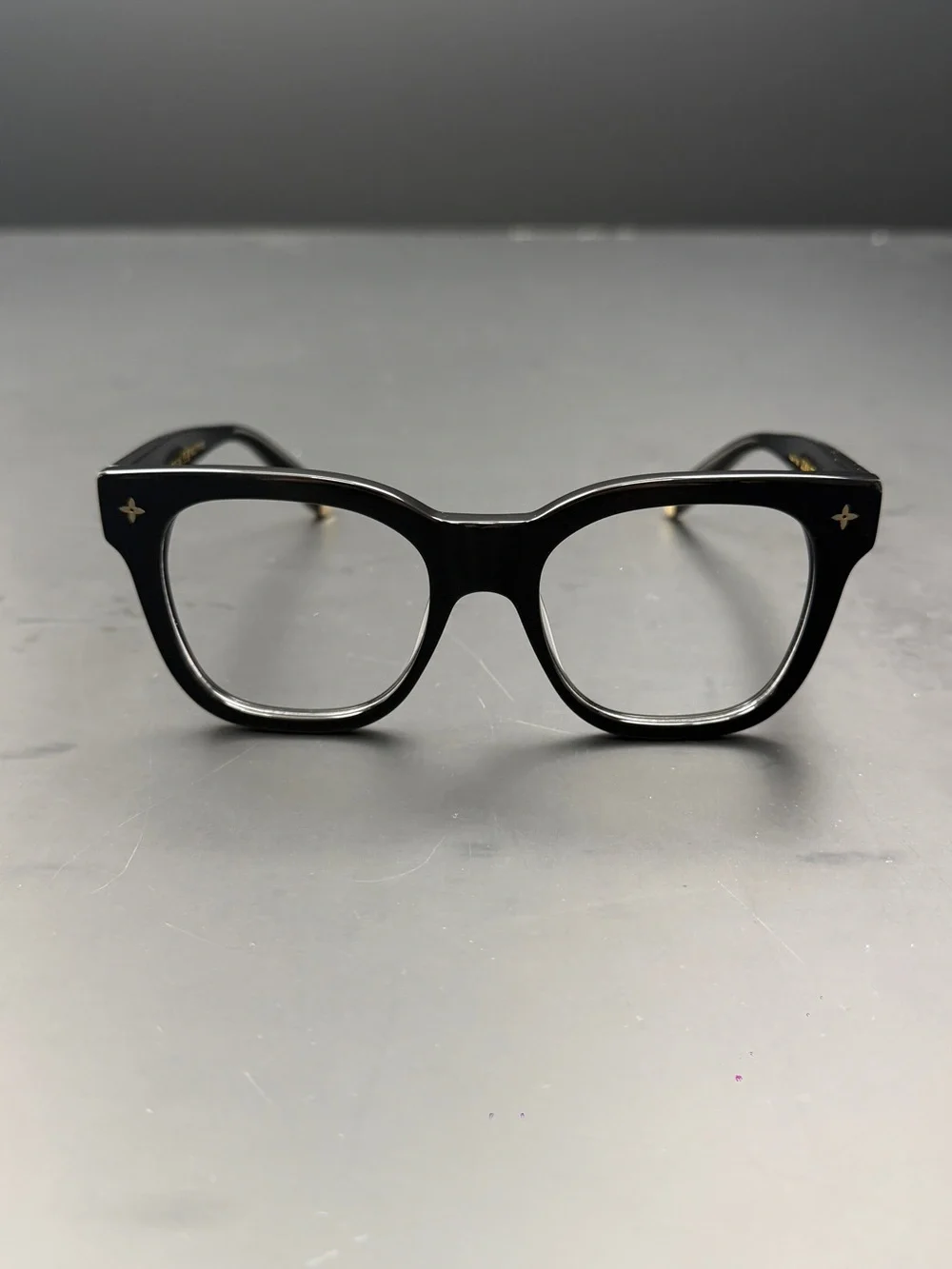 Louis Vuitton Black Frame Glasses with Gold Accents